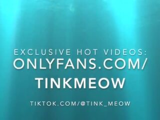 Tink Meow in a shower