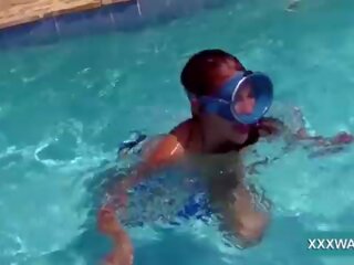 Groovy brunette hooker Candy swims underwater