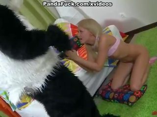 Teddy bear with a black cock in her mouth gave the blonde